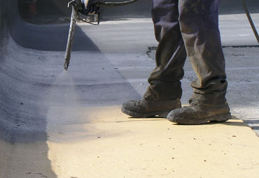 Coating systems over Hartford spray foam roof systems